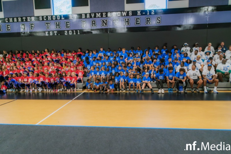 NFL Alumni Jax Caring for Kids — indoor group photo
